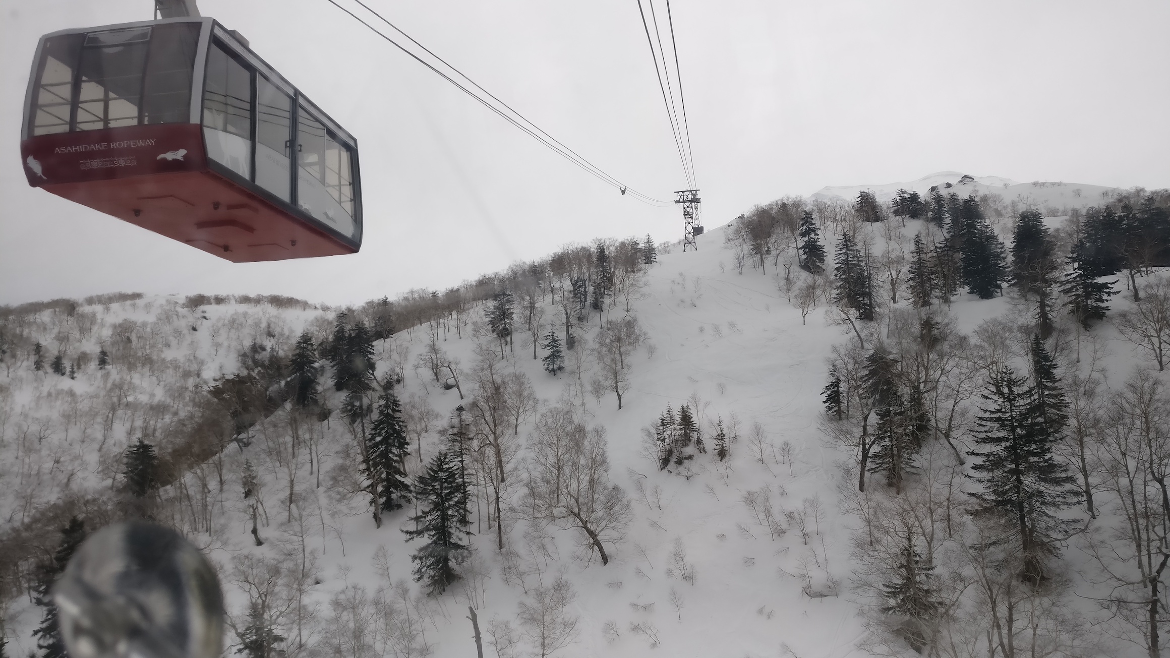 Taking the ropeway up Mt. Asahidake